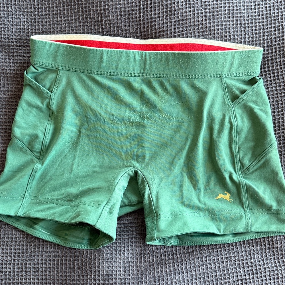 Tracksmith Green Athletic Shorts with Red Waistband Accent
